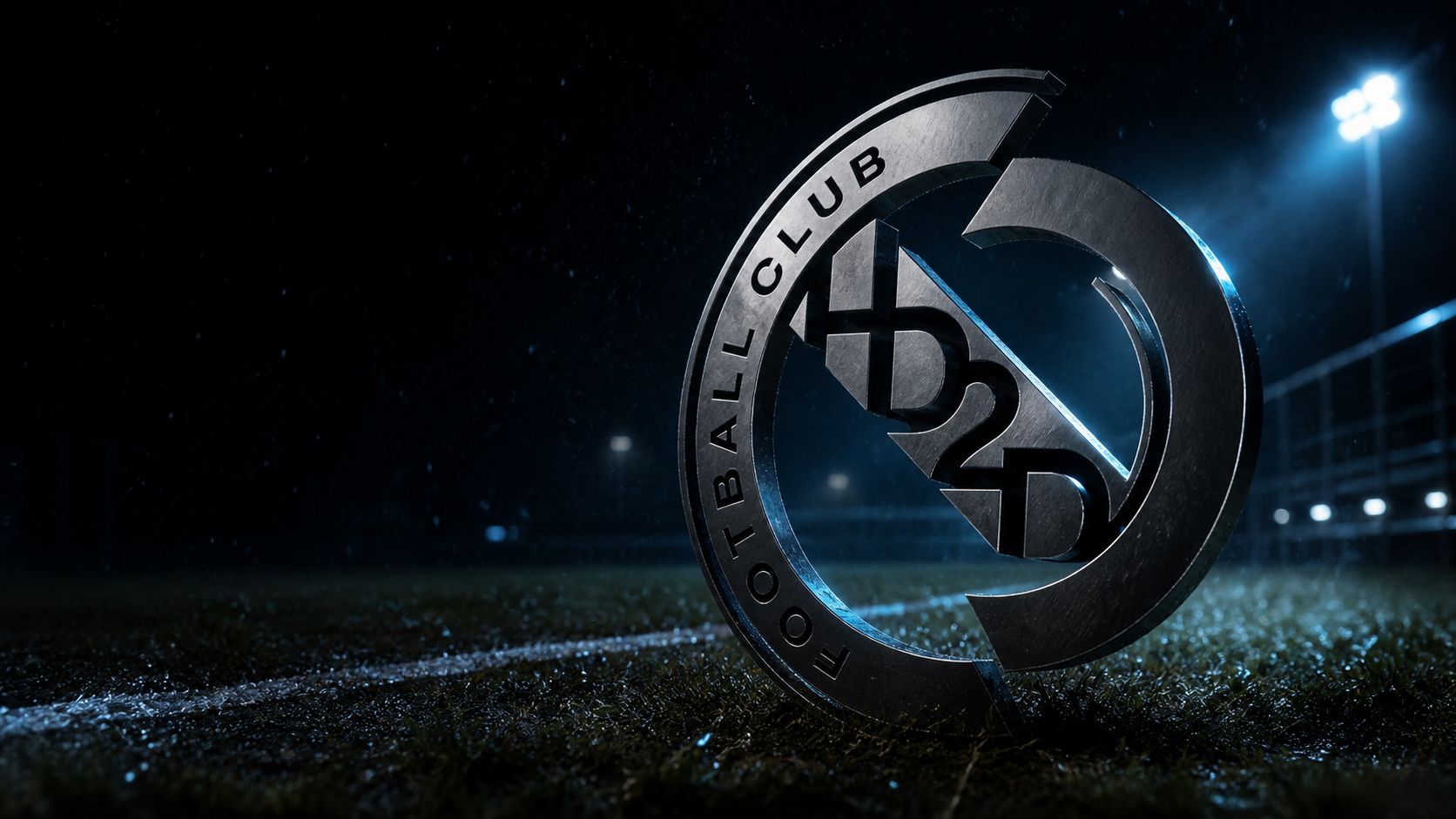 Prostorové logo FC HD2D na nočním fotbalovém hřišti